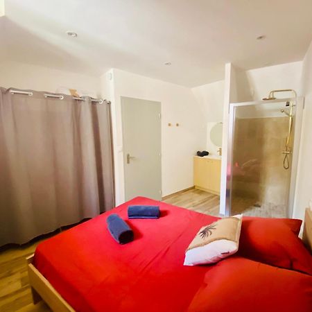Les Appartements Du Vieux Poussan ภายนอก รูปภาพ