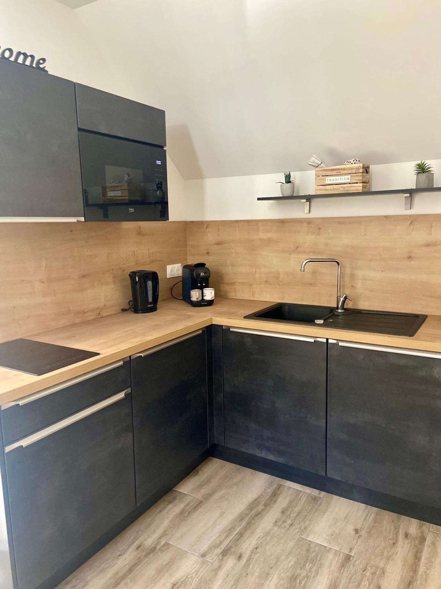 Les Appartements Du Vieux Poussan ภายนอก รูปภาพ